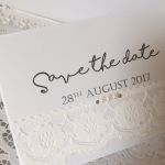 save the dates with lace ribbon